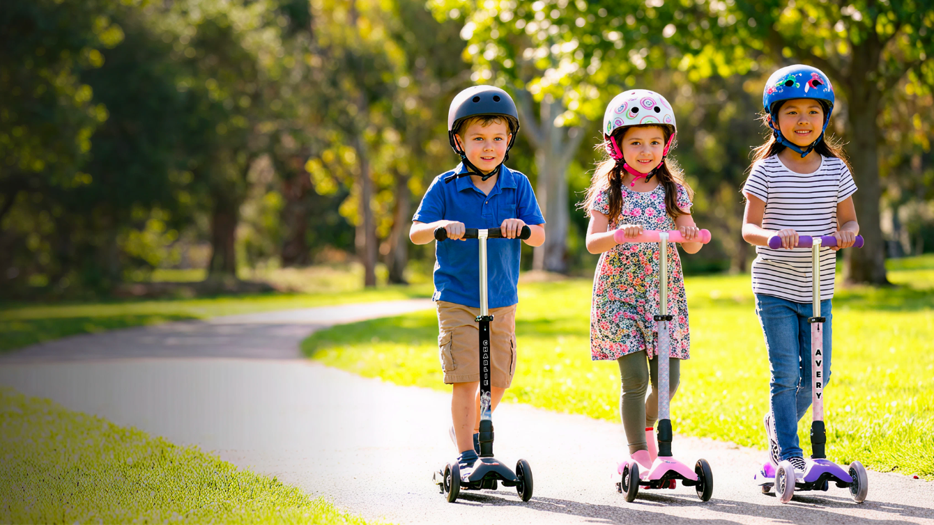 Kids riding Micro Mini and Micro Maxi scooters with ScooterSkin vinyl wraps, Brooklyn NY.